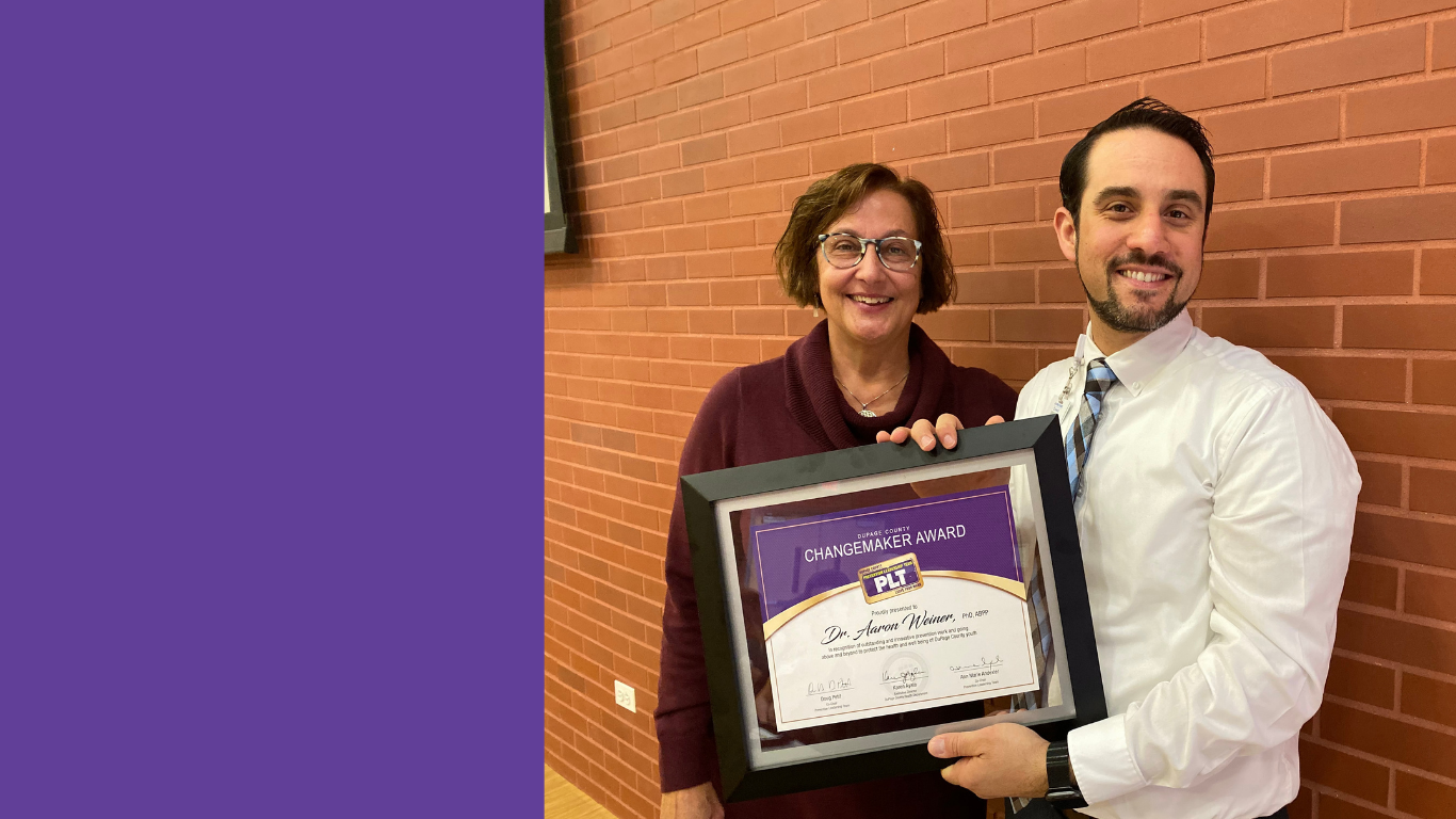 Photo of previous PLT Changemaker Award winners holding their certificates of appreciation.